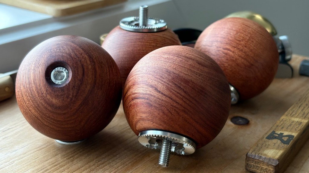 Pair of handmade wooden ball camera handles with ARRI rosette mount, 60mm diameter, rosewood finish